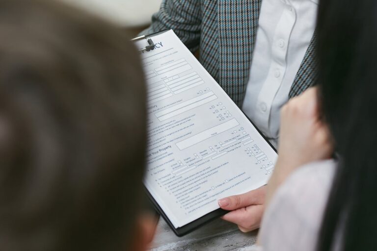 A Person Holding a Contract Document