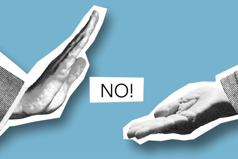 Entrepreneur rejecting offering from man with outstretched hand